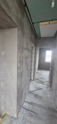 Штукатурка стен в коридоре новостройки